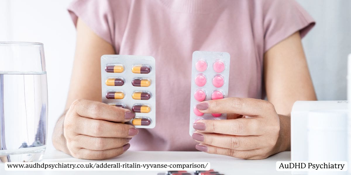 Person holding two blister packs of ADHD medications, comparing Adderall, Ritalin, and Vyvanse tablets side by side. 