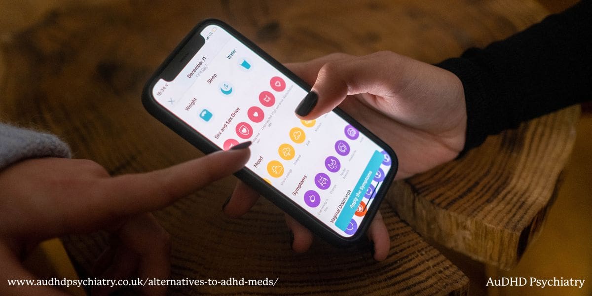 Person holding smartphone with ADHD productivity app as a digital alternative to ADHD meds